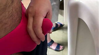 A GUY GIVE ME A HANDJOB AND I MAKE A HUGE LOAD IN PUBLIC TOILET